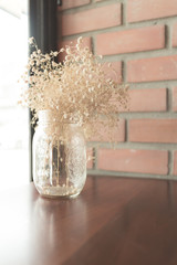Bouquet of dried flowers in vase for interior decoration.(vintage effect,selective focus)