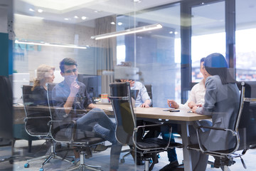 Startup Business Team At A Meeting at modern office building