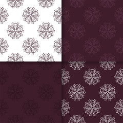 Set of floral colored seamless patterns. Maroon backgrounds