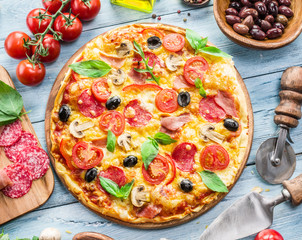 Pizza and ingredients. Food background.