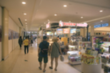 Blurred walking people mall