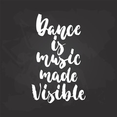 Fototapeta na wymiar Dance is music made visible - lettering dancing calligraphy quote drawn by ink in white color on the black chalkboard background. Fun hand drawn lettering inscription.