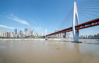 cityscape and skyline of downtown near water of chongqing