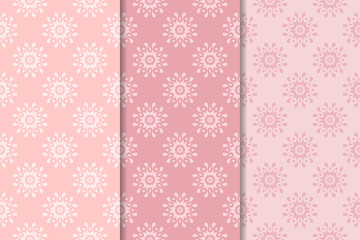 Pale pink set of floral ornaments. Seamless patterns