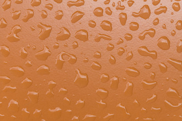 Raindrops on brown ceramic tile for background