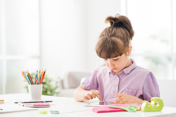 Cute girl using a digital tablet