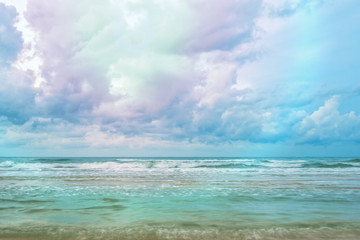 Beach with wave splash with beautiful and cloud sky before the storm came.