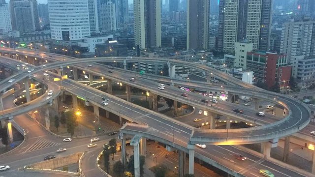 intersection of elevated road and modern buildings in chengdu at twilight