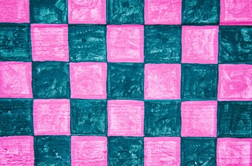 Pink and black checkerboard pattern on wood panel background