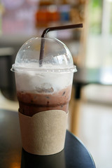 Chocolate frappe on a table in a coffee shop, selective focus