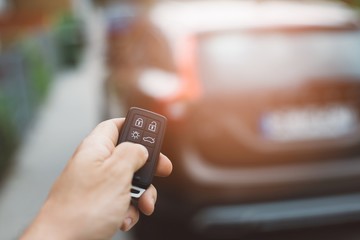 Man opening or closing car