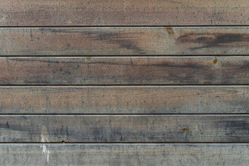 Wooden boards from which the wall of the house is made.