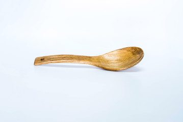 Wooden spoon on White background