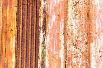Old rusty metal fence as an abstract background