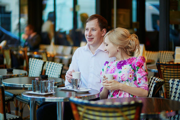 Romantic loving couple drinking coffee