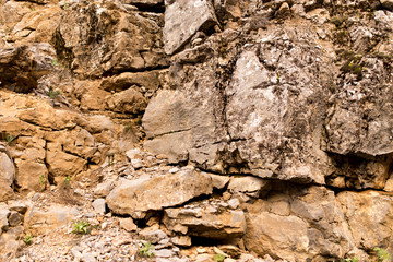 Stone cliffs in the mountains as a background