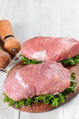 Fresh raw meat on a board