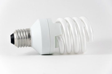 Close up of energy saving fluorescent light bulb isolated on white background