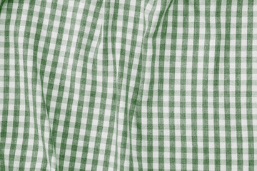 green and white checkered fabric background texture