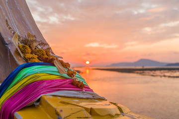 Traditional long-tail boat on the beach in Thailand