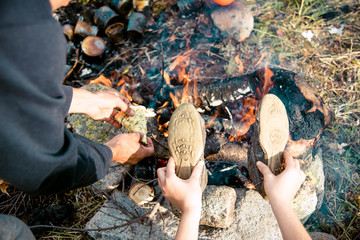 Shoes by the fire dries