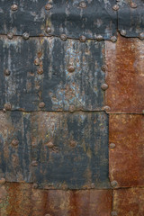 The old iron wall of a building