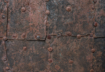 The old iron wall of a building