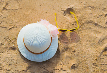 Fototapeta na wymiar Beach accessories with straw-hat,Sun glasses