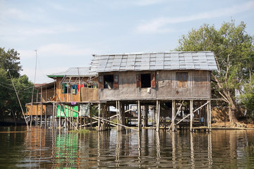 Fototapeta na wymiar Traditional wooden stilt houses on the Lake Inle Myanmar