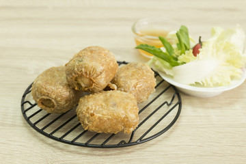 FRIED CRAB DUMPLING ON GRILL
Fried crab dumpling on grill with sweet and sour sauce. 