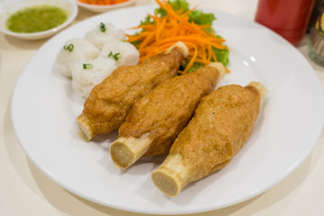 Fried shrimp mousse on sugar cane skewer or Chao Tom Vietnamese food