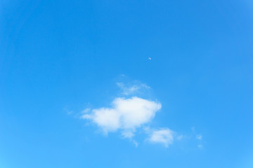 blue sky with cloud and little moon