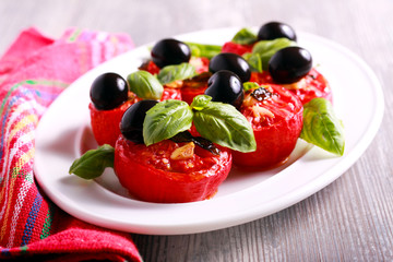 Roasted tomato salad with olives and basil