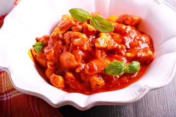 Chicken breast pieces in tomato sauce
