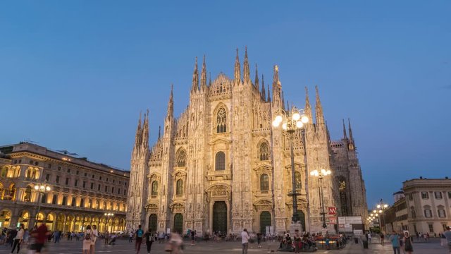 Milan city skyline day to night timelapse at Milano Duomo Cathedral, Milan, Italy, 4K Time lapse
