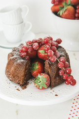 Piece of chocolate cake with fresh berries