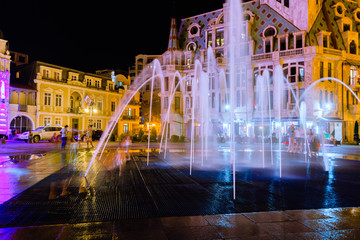 Kids near the fountain in night