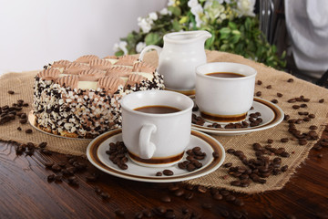 Black coffee with grains and coffee cake