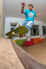 Skateboarder performing a pivot grind