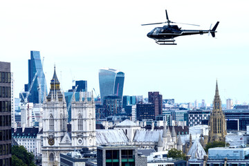 Helicopter over London skyline, old and new