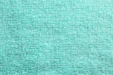 Fototapeta premium Textured fabric background in mint color