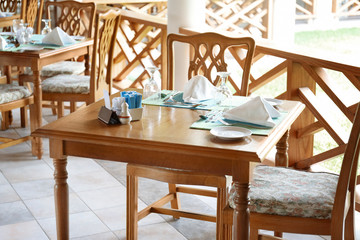 Table set in modern cafe at resort