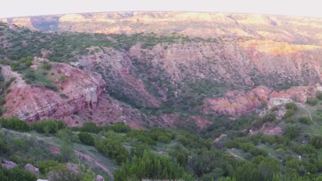 Palo Duro canyon, Texas state park. August, 2017. POV. point aerial view of canyon at sunset.