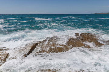 Rocky shore of the Adriatic sea after storm