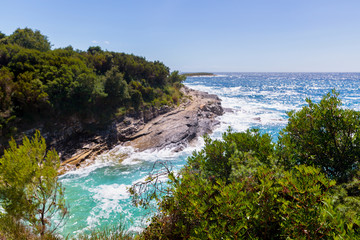 Rocky shore of the Adriatic sea after storm