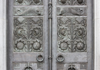 two rings and ornament with fish on the outer doors of the Naval Cathedral of St. Nicholas,...