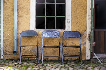Fototapeta na wymiar Three chairs