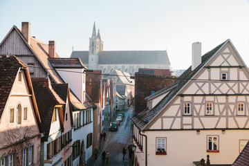 Obraz premium View of a beautiful street with traditional German houses in Rothenburg ob der Tauber in Germany. European city.