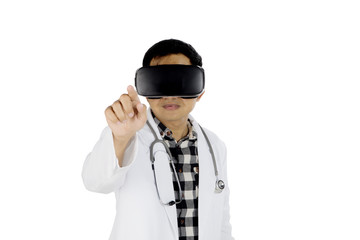 Young doctor with virtual reality glasses