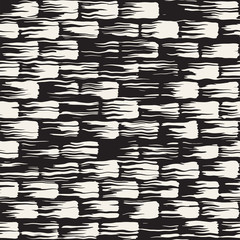 Vector seamless pattern with brush stripes and strokes. Black and white background with ink elements. Hand painted grunge texture.